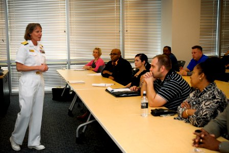 US Navy 100323-N-2389S-001 Rear Adm. Robin Graf, deputy commander of Navy Recruiting Command, discusses the U.S. Navy maritime strategy with military division employees at the University of Phoenix photo