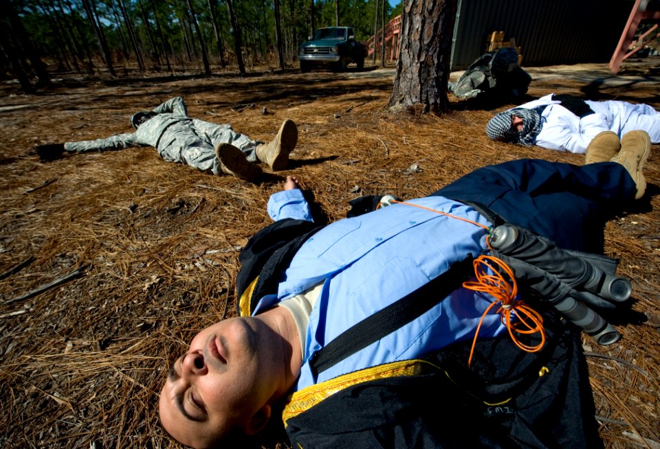 US Navy 100323-N-6932B-151 Sailors undergo training in a simulated terrorist attack scenario during the U.S. Navy Individual Augmentee Combat Training course