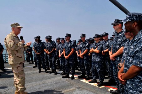 US Navy 100326-N-8273J-076 Chief of Naval Operations (CNO) Adm. Gary Roughead speaks with Sailors during an all-hands call aboard the guided-missile destroyer USS COLE (DDG 67) photo