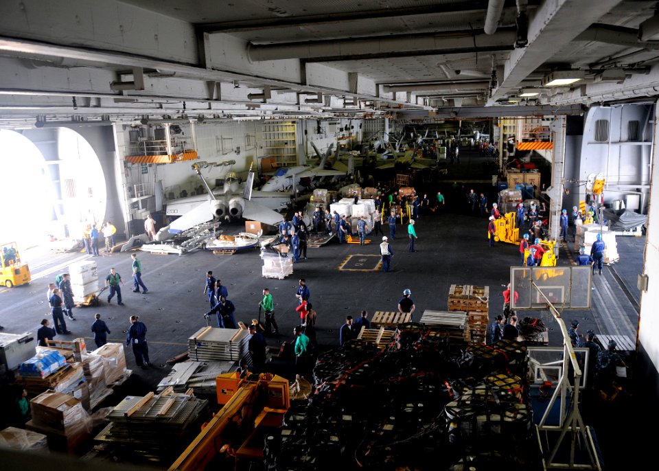 US Navy 100325-N-4236E-138 Sailors participate in a replenishment at sea aboard USS Dwight D. Eisenhower (CVN 69)