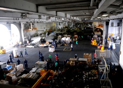 US Navy 100325-N-4236E-138 Sailors participate in a replenishment at sea aboard USS Dwight D. Eisenhower (CVN 69)