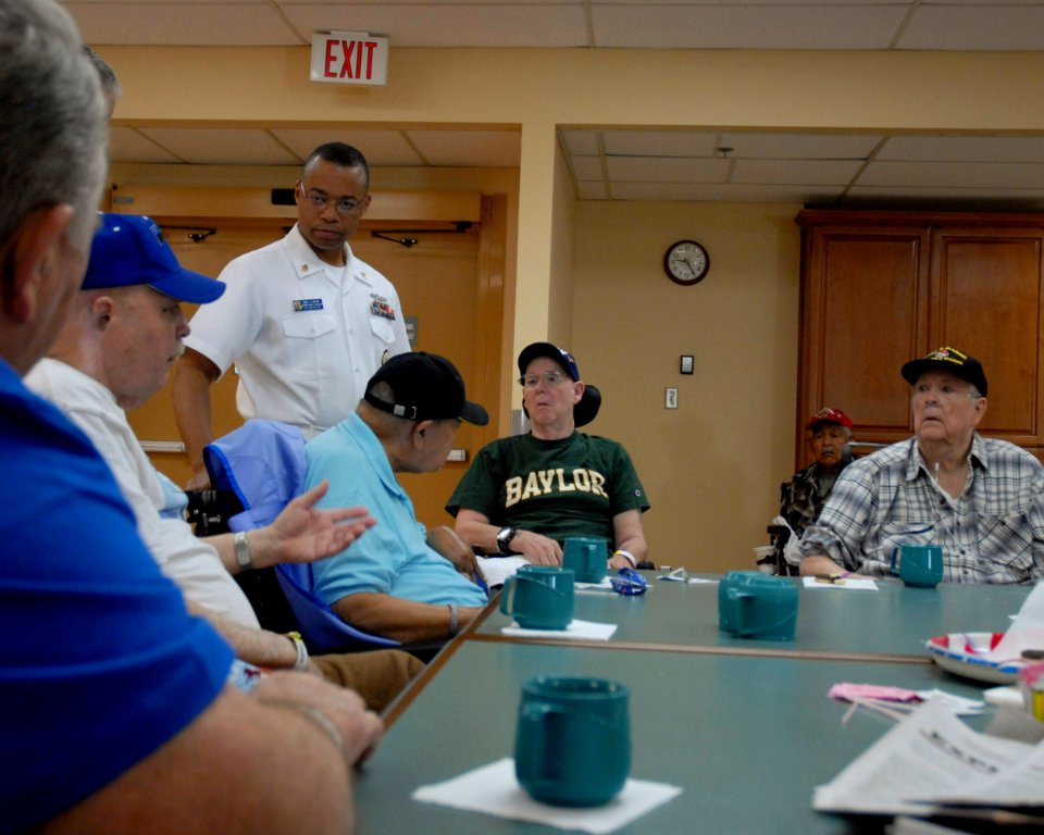 US Navy 100327-N-2389S-072 Chief Petty Officer J. C. Waters, assigned to USS Ford (FFG 54), meets with retired service members at the Veterans Affairs Hospital in Phoenix, Ariz