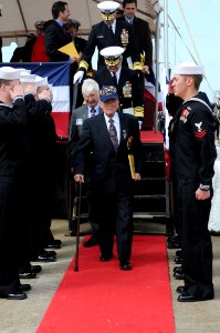 US Navy 100327-N-3154P-114 Retired Chief Warrant Officer, George Smith, departs the stage with other honored guests and speakers following the commissioning of USS New Mexico (SSN 779) aboard Naval Station Norfolk Mar. 27