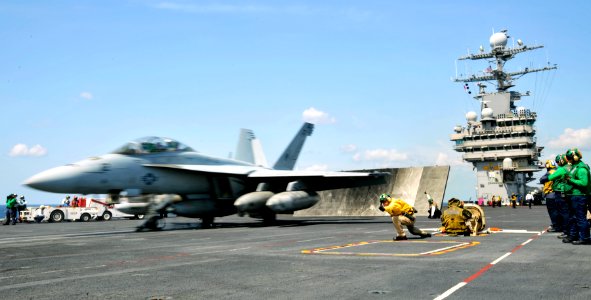 US Navy 100325-N-6003P-855 An F-A-18E Super Hornet assigned to the Swordsmen of Fighter Attack Squadron (VFA) 32 launches from the Nimitz-class aircraft carrier USS Harry S. Truman (CVN 75)