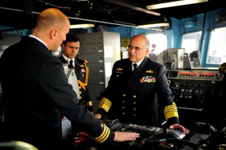 US Navy 100324-N-8590G-003 Chief of Naval Staff of the Pakistan Navy Adm. Noman Bashir listens to Cmdr. Scott M. Smith, commanding officer of the guided-missile frigate USS Klakring (FFG 42)