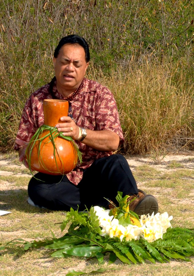 US Navy 100326-N-0535P-059 Kunane Aipoalani, transportation coordinator for Pacific Missile Range Facility (PMRF) and member of the Kauai Burial Council, performs an oli, a chant written by Auntie Ulu Kilanuano