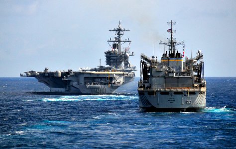 US Navy 100326-N-4774B-106 The Military Sealift Command fast combat support ship USNS Rainier (T-AOE 7) approaches the Nimitz-class aircraft carrier USS Carl Vinson (CVN 70) during an exercise with the guided-missile cruiser US