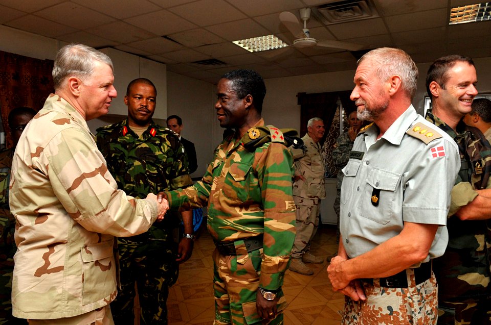 US Navy 100326-N-8273J-229 Chief of Naval Operations (CNO) Adm. Gary Roughead meets with coalition forces during a dinner with senior military leaders at Camp Lemonnier, Djibouti