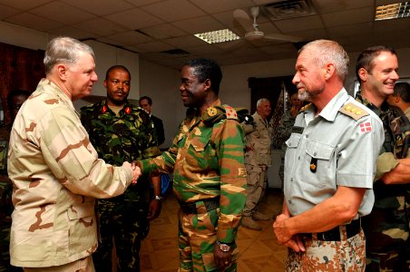 US Navy 100326-N-8273J-229 Chief of Naval Operations (CNO) Adm. Gary Roughead meets with coalition forces during a dinner with senior military leaders at Camp Lemonnier, Djibouti