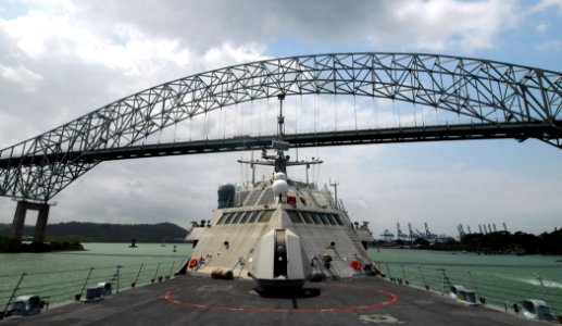 US Navy 100329-N-7058E-033 The littoral combat ship USS Freedom (LCS 1) passes beneath the Bridge of the Americas as it departs Panama City following a theater security cooperation port visit as part of operations in the U.S. 4 photo