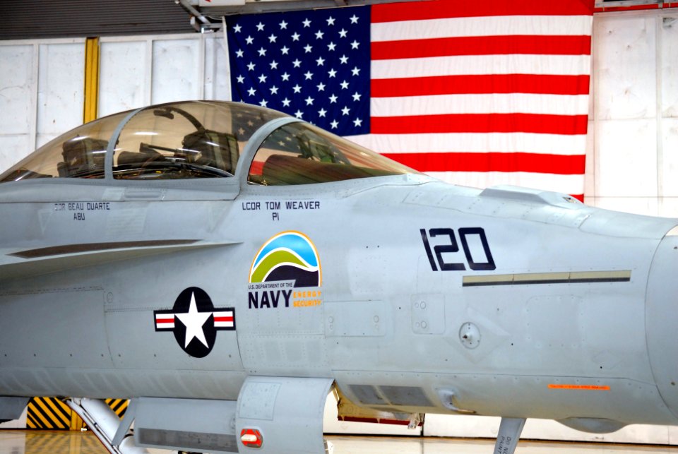 US Navy 100330-N-9565D-024 An F-A-18 Super Hornet from Air Test and Evaluation Squadron (VX) 23 with green markings and the U.S. Department of the Navy Energy Security logo