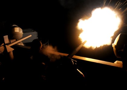 US Navy 100327-N-4236E-102 Sailors fire a saluting battery aboard the aircraft carrier USS Dwight D. Eisenhower (CVN 69)