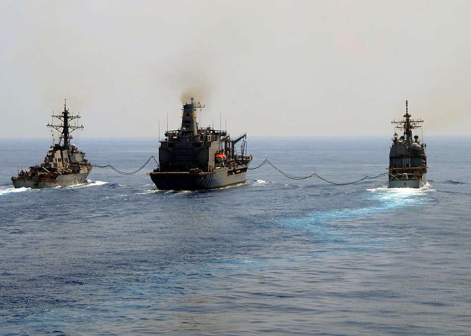 US Navy 100329-N-1082Z-003 USNS Patuxent (T-AO 201) conducts a replenishment at sea with USS McFaul (DDG 74) and USS San Jacinto (CG 56)