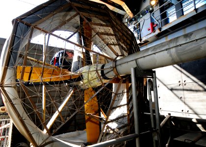 US Navy 100328-N-7948R-327 Gas Turbine System (Mechanical) 3rd Class William White from Houston, TX checks for hydraulic leaks on a Landing Craft Air Cushion (LCAC) aboard amphibious dock landing ship USS Pearl Harbor (LSD 52)