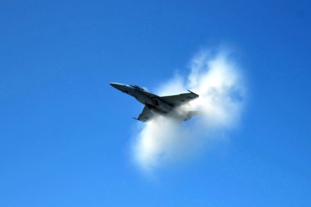 US Navy 100328-N-2953W-257 An F-A-18 Super Hornet breaks the sound barrier during a flight demonstration for Peruvian visitors aboard the aircraft carrier USS Carl Vinson (CVN 70)