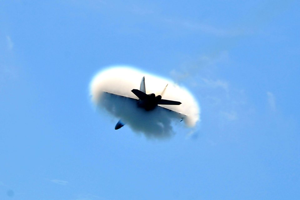 US Navy 100327-N-2953W-252 An F-A-18 Super Hornet embarked aboard the aircraft carrier USS Carl Vinson (CVN 70) breaks the sound barrier
