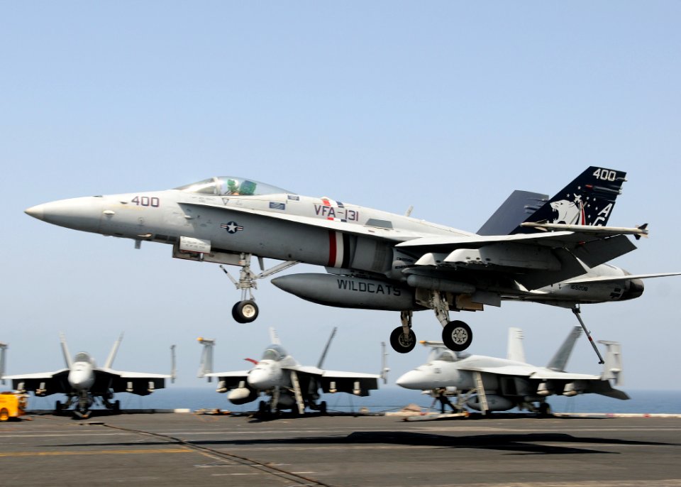 US Navy 100329-N-4236E-148 An F-A-18C Hornet assigned to the Wildcats of Strike Fighter Squadron (VFA) 131 prepares to catch an arresting wire