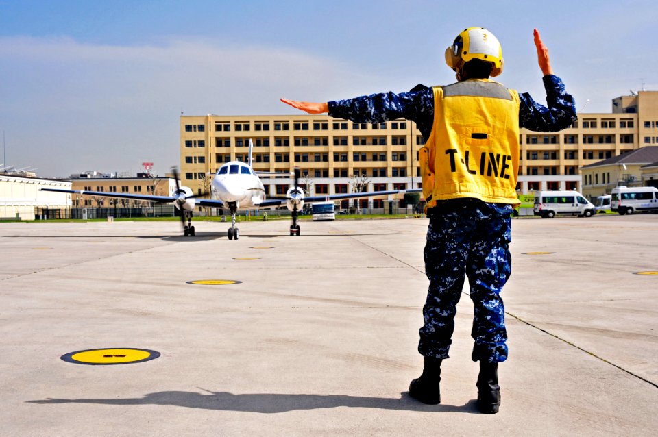 US Navy 100329-N-7364R-048 Aviation Boatswain's Mate Handler Airman Rickeisha Ridout, assigned to the Air Operations Department's