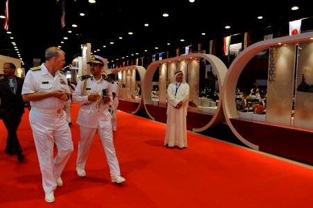 US Navy 100330-N-8273J-050 Chief of Naval Operations (CNO) Adm. Gary Roughead speaks with Qatari Col. Abdullah Eid Al-Bourdainiby at the Doha International Maritime Defense Exhibition (DIMDEX) Mid East Naval Commander's Confere