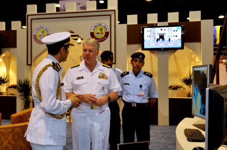 US Navy 100330-N-8273J-014 Qatari Emiri liaison officer Col. Abdullah Eid Al-Bourdaini speaks about the Qatar Coast Guard with the Chief of Naval Operations (CNO) Adm. Gary Roughead