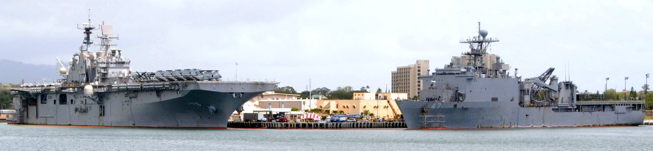US Navy 100405-N-3666S-162 The amphibious assault ship USS Bonhomme Richard (LHD 6) and the amphibious dock landing ship USS Rushmore (LSD 47) are docked at Mike Pier at Joint Base Pearl Harbor-Hickam