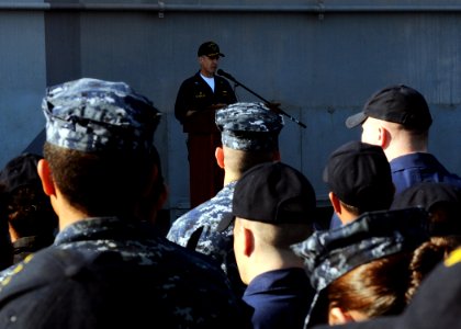 US Navy 100402-N-4649B-045 Capt. Steve Koehler addresses the crew during an all-hands call on the flight deck of USS Bataan (LHD 5).