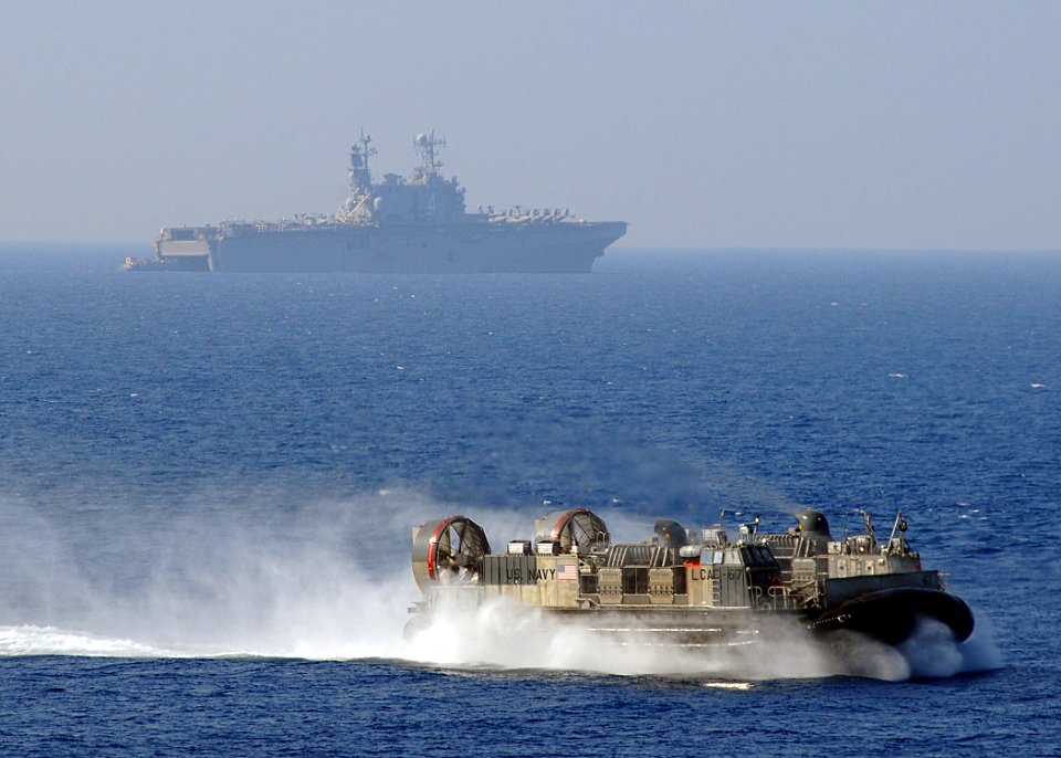 US Navy 100401-N-1082Z-029 Landing Craft Air Cushion (LCAC) 67, assigned to Assault Craft Unit (ACU) 4, transports personnel and equipment