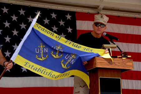 US Navy 100401-N-5821P-014 Master Chief Petty Officer Jeffrey Covington kicks off the Southwest Asia Chief Petty Officer Association picnic, celebrating the 117th birthday of the U.S. Navy chief petty officer rank