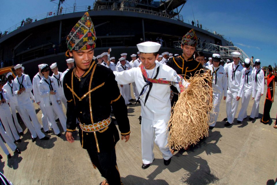 US Navy 100403-N-5086M-201 Malaysian dancers teach Sailors assigned to the U.S. 7th Fleet command ship USS Blue Ridge (LCC 19) how to perform the traditional Malaysian murut dance upon the arrival in Sepangar, Malaysia