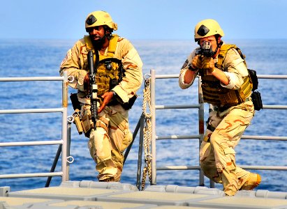 US Navy 100407-N-4774B-282 Members of a visit, board, search and seizure team from the littoral combat ship USS Freedom (LCS 1) conduct tactical exercises aboard the guided-missile cruiser USS Bunker Hill (CG 52) photo