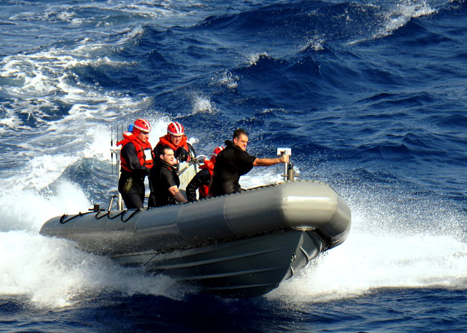 US Navy 100405-N-7908T-108 Sailors assigned to the aircraft carrier USS George H.W. Bush (CVN 77) return to the ship after conducting a man overboard recovery drill