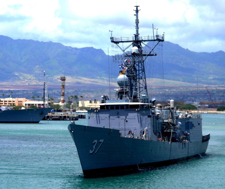 US Navy 100402-N-7498L-168 The guided-missile frigate USS Crommelin (FFG 37) makes its way to a new pier location at Joint Base Pearl Harbor-Hickam. Crommelin is scheduled to participate in the Merrie Monarch Festival at Hilo