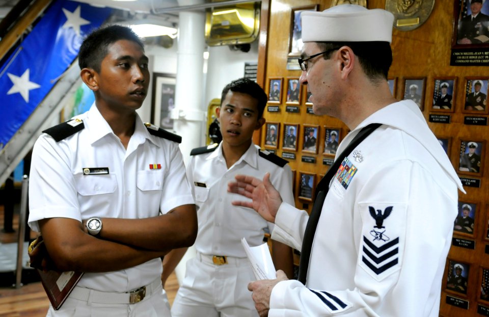 US Navy 100405-N-7280V-079 Mass Communication Specialist 1st Class Todd Macdonald gives Sailors from the Royal Malaysian navy a tour of the ship