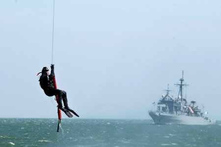 US Navy 100406-N-9123L-010 A diver is recovered by helicopter during a medical evacuation training exercise involving the U.S. and Republic of Korea navies