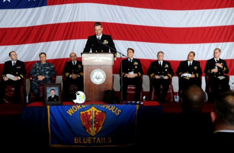 US Navy 100407-N-4236E-111 Cmdr. Joseph Finn, commanding officer of Carrier Airborne Early Warning Squadron (VAW) 121, delivers remarks during a memorial service for Lt. Steven Zilberman aboard the aircraft carrier USS Dwight D