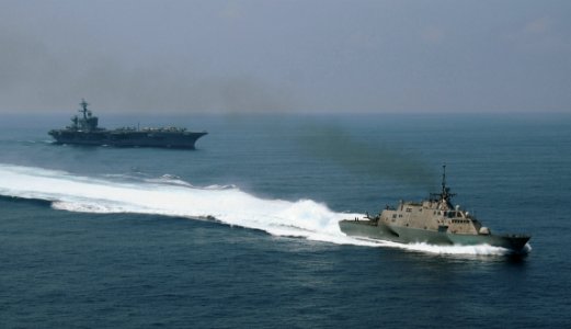 US Navy 100407-N-0808V-253 The littoral combat ship USS Freedom (LCS 1) breaks away from the Nimitz-class aircraft carrier USS Carl Vinson (CVN 70) after a refueling at sea