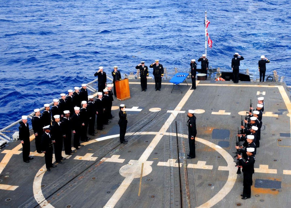 US Navy 100407-N-9301W-224 ailors aboard the guided-missile frigate USS Klakring (FFG 42) render honors during a burial at sea