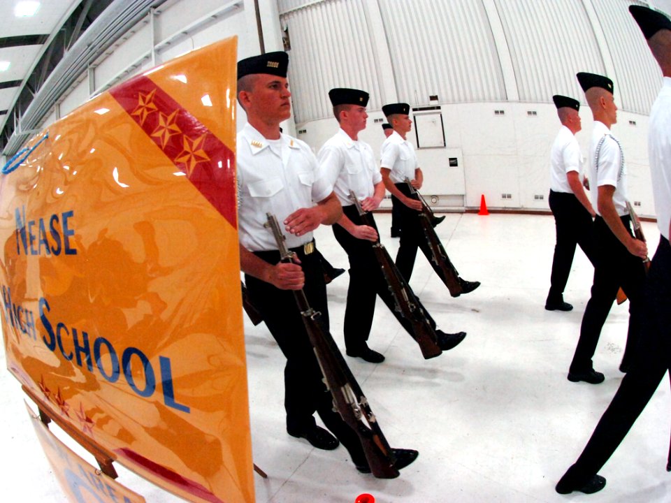 US Navy 100411-N-4482V-002 Members of the Nease High School (Jacksonville, Fla.) armed drill team advance onto the exhibition area during the second day of the Navy Junior ROTC national competition