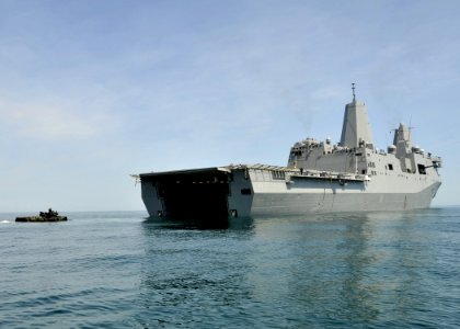 US Navy 100412-N-2147L-004 An amphibious assault vehicle from the U.S. Marine 2nd Assault Amphibious Battalion prepares to enter the well deck of the amphibious transport dock ship USS New York (LPD 21)