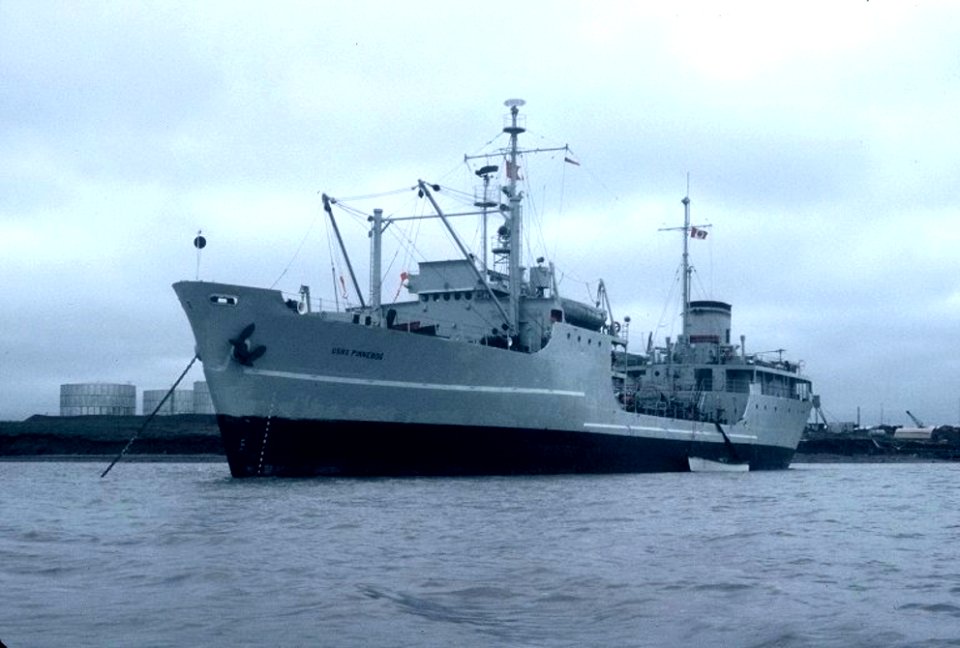 USNS Pinnebog (T-AOG-58) at anchor off Tuktoyaktuk, Canada, circa in 1973