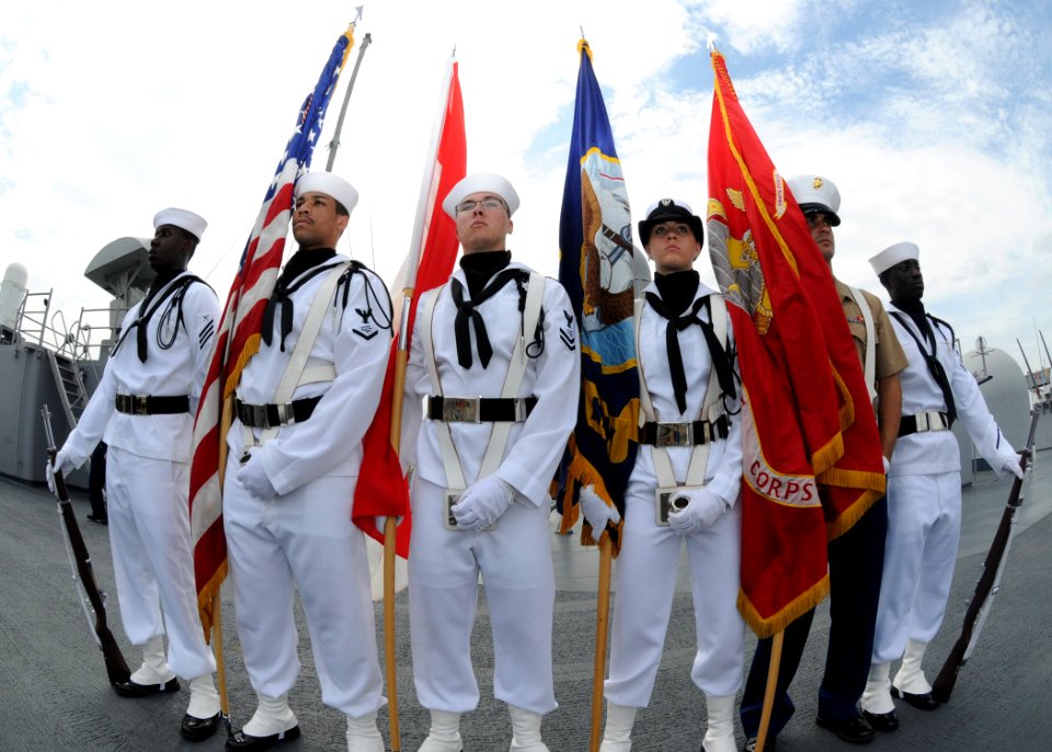 US Navy 100411-N-8721D-001 The colors detail aboard the U.S. 7th Fleet command ship USS Blue Ridge (LCC 19) present the colors