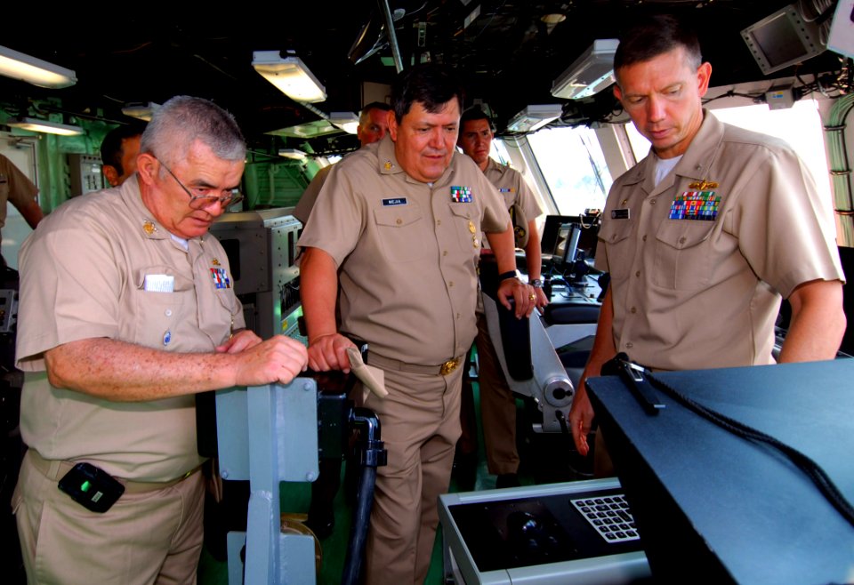US Navy 100411-N-7058E-127 Cmdr. Randy Garner explains the ship's equipment monitoring systems to Mexican navy Adm. Nestor Yee and Mexican navy Vice Adm. Jaime Mejia