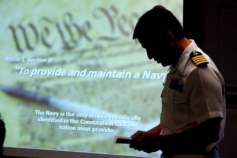 US Navy 100415-N-8863V-143 Capt. Jay Kadowaki, commanding officer of Naval Surface Warfare Center (NSWC), Corona Division, reads the Navy's mandate from the U.S. Constitution