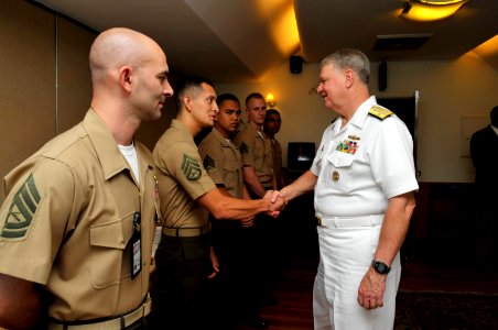 US Navy 100412-N-8273J-090 Chief of Naval Operations (CNO) Adm. Gary Roughead meets with members of the U.S. Marine Corps security detachment at the U.S. Embassy in New Delhi