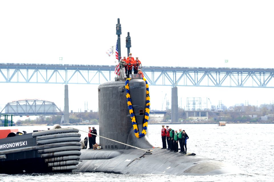 US Navy 100413-N-8467N-001 The attack submarine USS Virginia (SSN 774) makes her way up the Thames River to Submarine Base New London photo