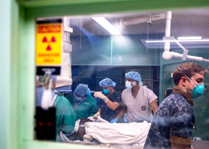 USNS Mercy Sailors Treat Patient (49771102497)