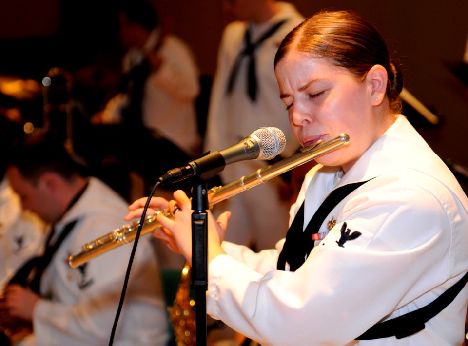 US Navy 100417-N-1675O-227 Musician 3rd Class Danielle Clark plays the flute during a U.S. 7th Fleet band concert at Mahidol University in Bangkok, Thailand