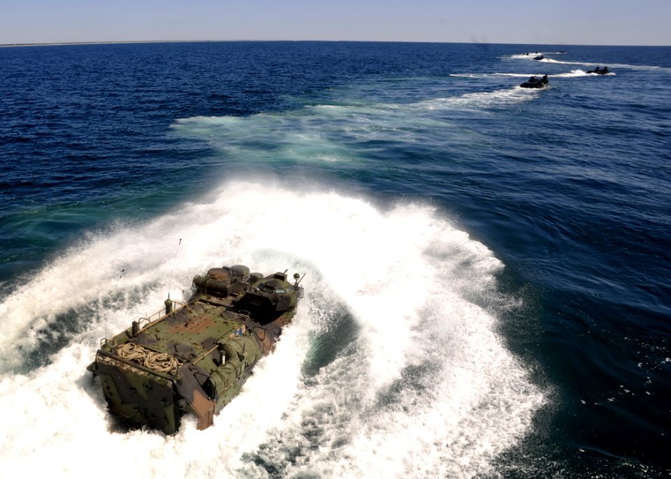 US Navy 100415-N-2147L-003 Amphibious assault vehicles from the U.S. Marine 2nd Assault Amphibious Battalion depart the well deck of the amphibious transport dock ship USS New York (LPD 21)