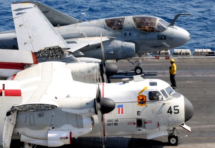 US Navy 100415-N-4236E-225 An EA-6B Prowler and and a C-2A Greyhound prepare to catapult from the aircraft carrier USS Dwight D. Eisenhower (CVN 69)