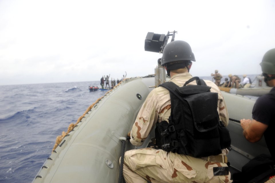 US Navy 100415-N-8959T-037 Members of a visit, board, search, and seizure team from the Arleigh Burke-class guided-missile destroyer USS Farragut (DDG 99) prepare to board a suspicious dhow
